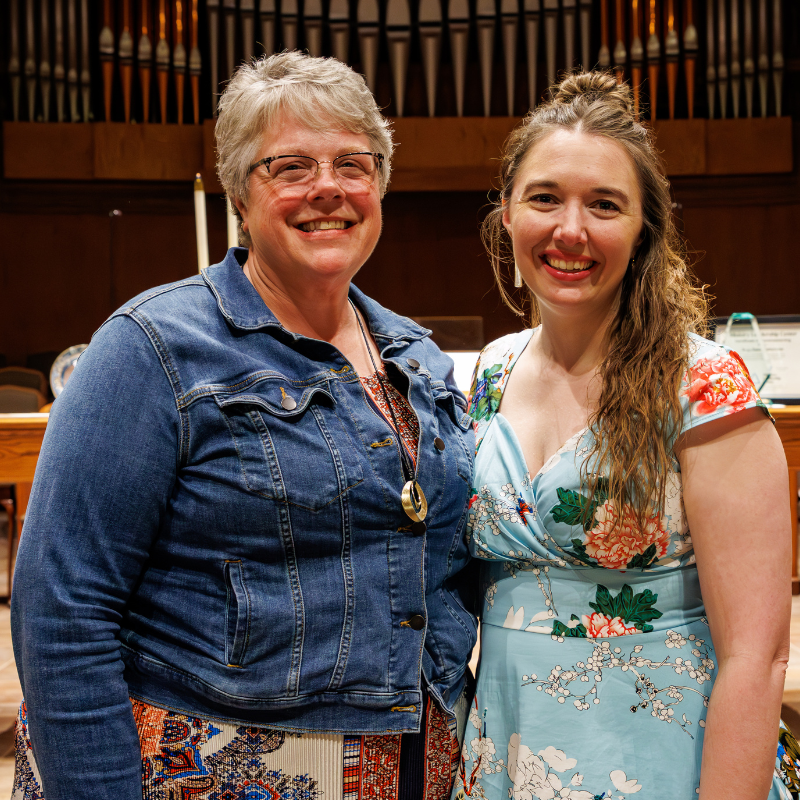 Certificate Graduate standing with her Ministry Leadership Center Coach